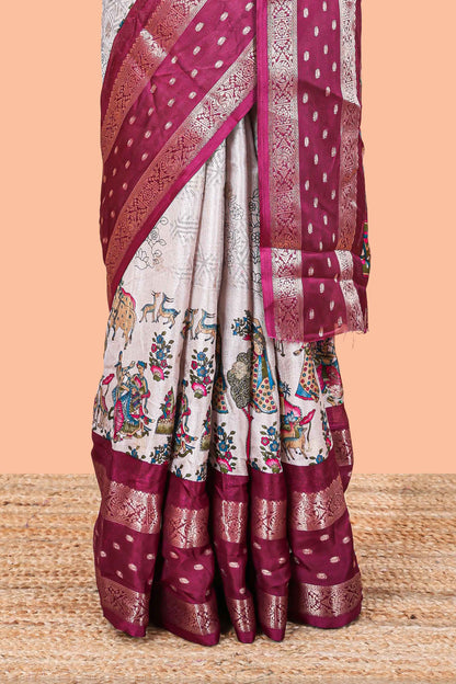 White Kalamkari style floral and crane birds print marsh georgette saree with maroon zari border and printed pallu