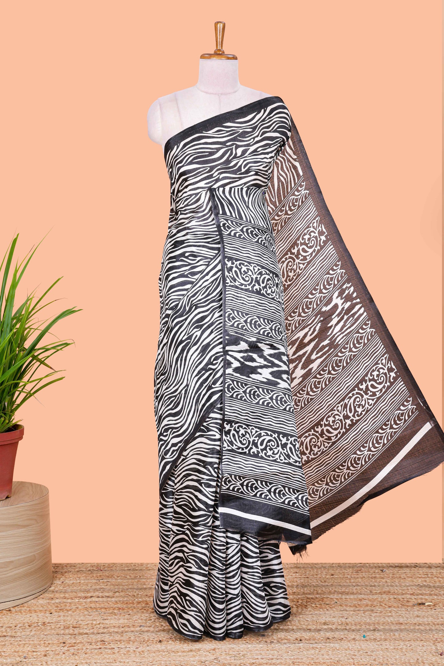 khadi cotton saree with zebra print all over body and pallu along with contrast blouse