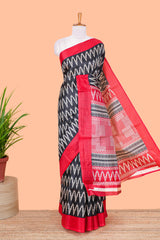 Black ikkat style chevron print south cotton saree with contrast border and blouse