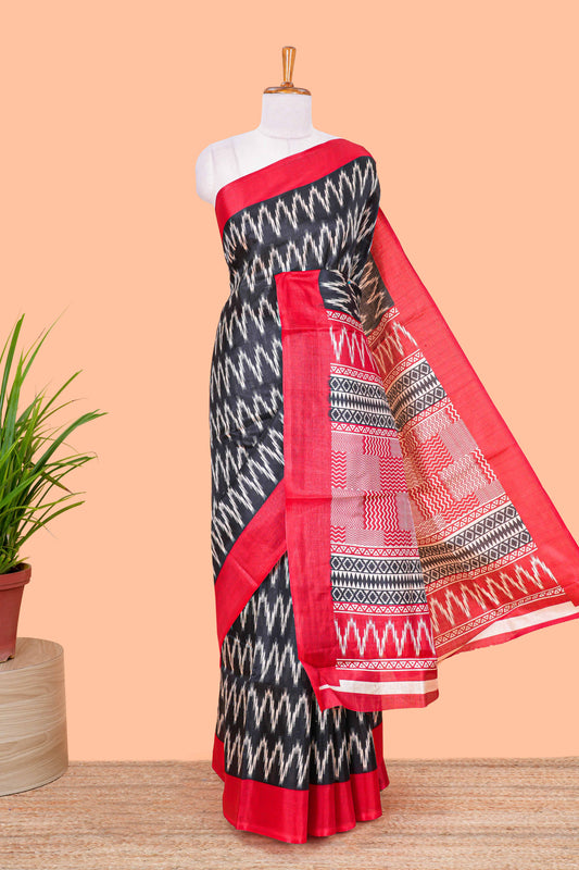 Black ikkat style chevron print south cotton saree with contrast border and blouse