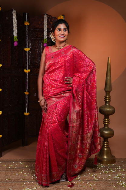 Rani pink bandhani style georgette saree with self stone work design border and pallu