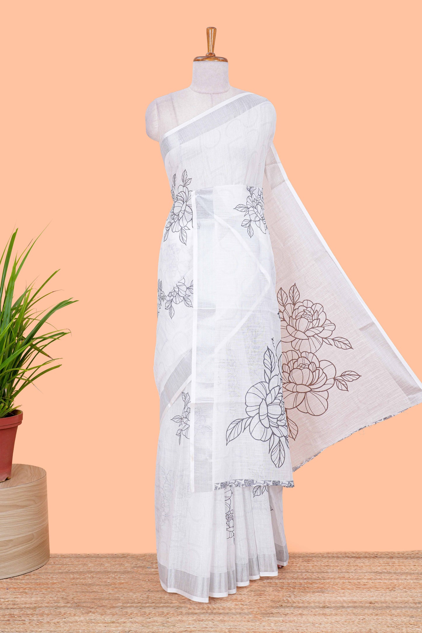 White floral design linen cotton saree with self silver zari border printed blouse