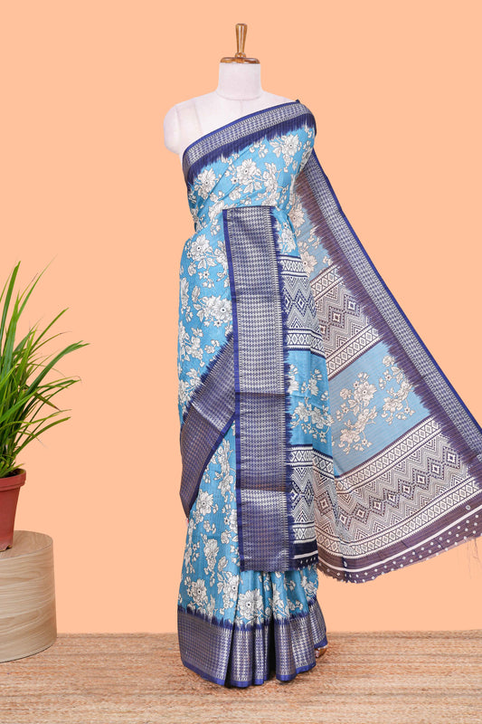 Blue dola silk saree with rico zari work, floral print and elegant jacquard border