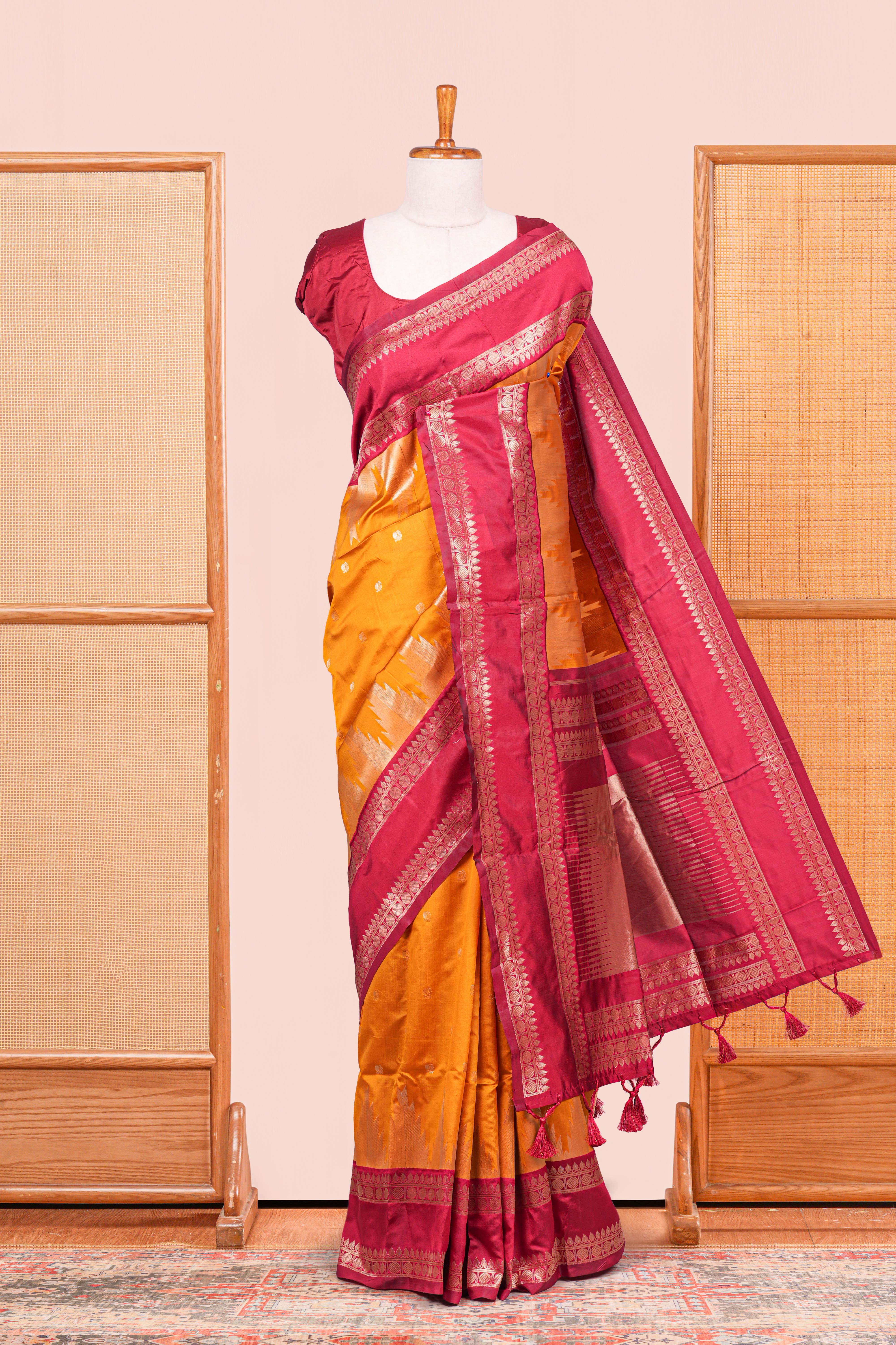 Mustard Yellow Semi Art Silk Saree Golden Zari Motifs Along With Thalampoo Zari Woven Across The Body And Rich Golden Zari Pallu