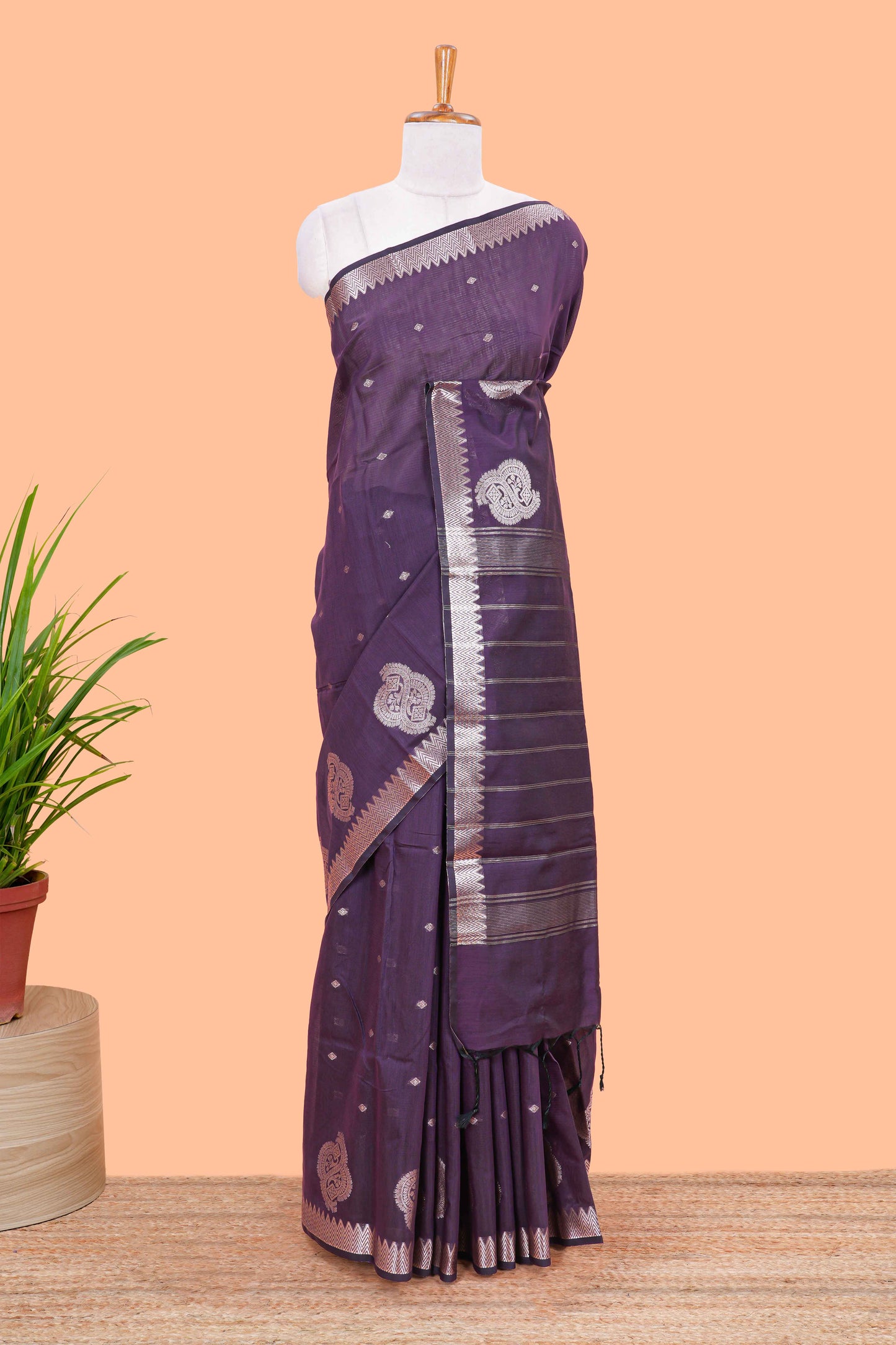 Purple mushru silk saree with zari butta, self zari border and striped pallu