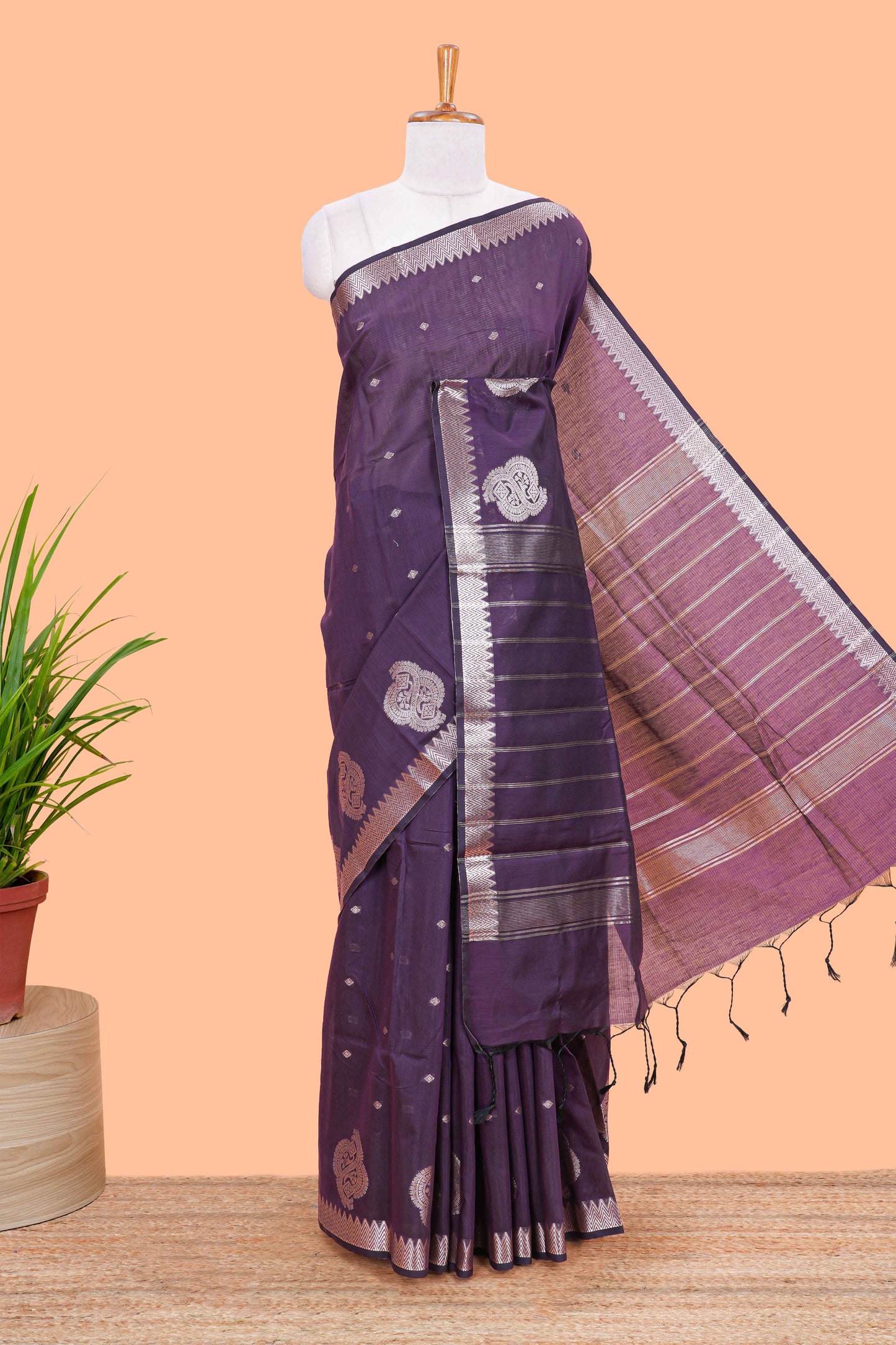 Purple mushru silk saree with zari butta, self zari border and striped pallu