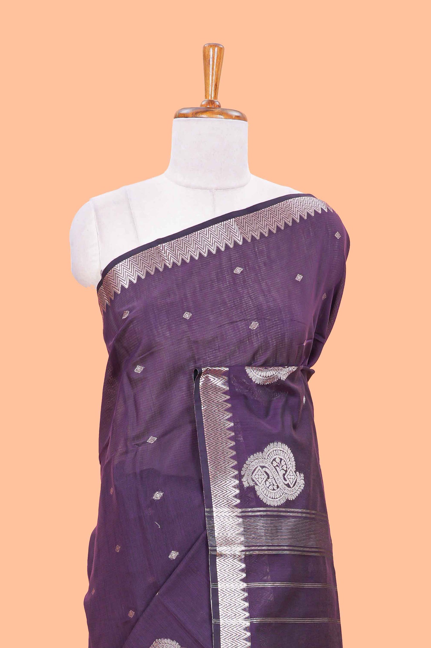 Purple mushru silk saree with zari butta, self zari border and striped pallu