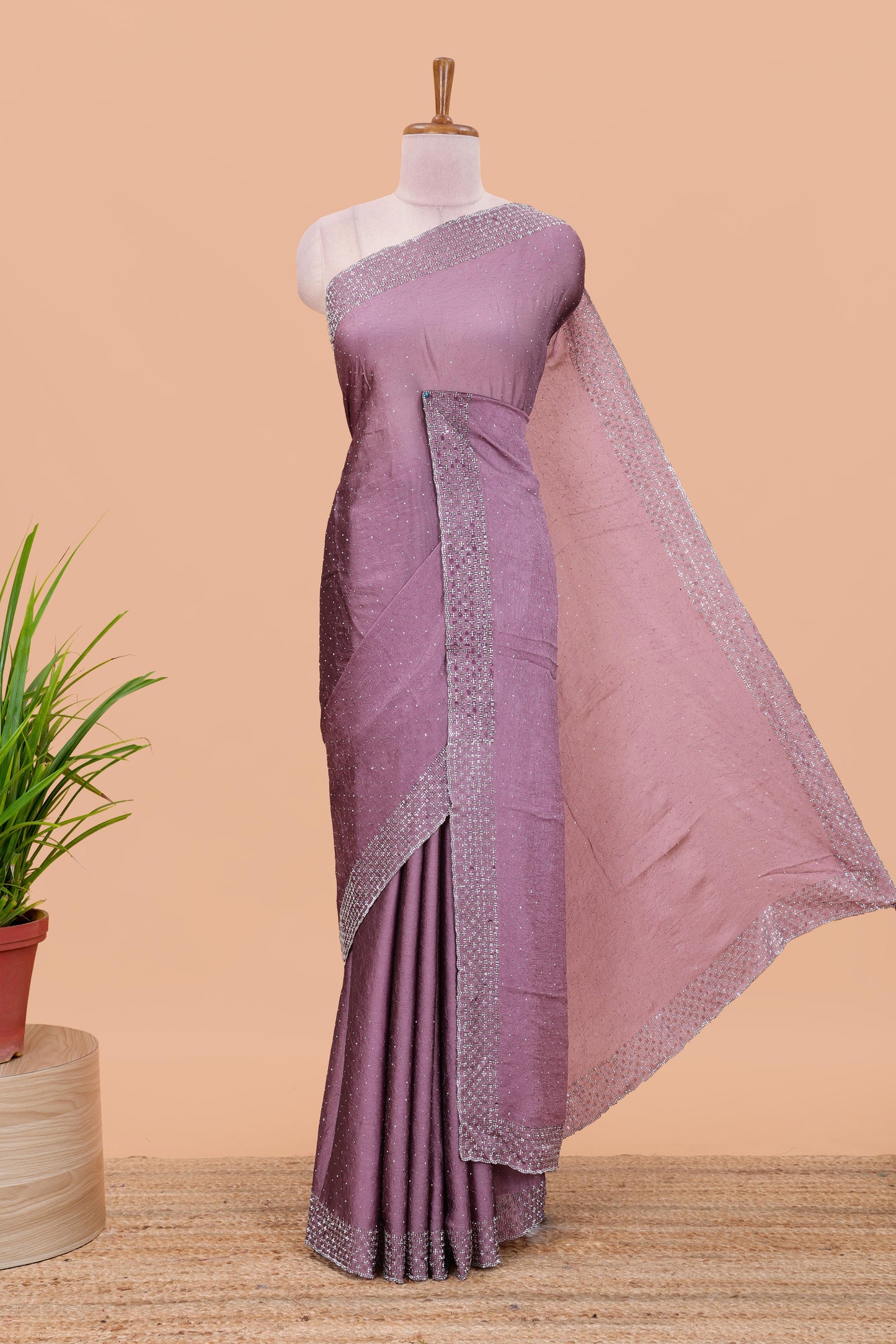 Pink chiffon georgette crush saree with all-over stone work, stone & beads border, and short stone work pallu with contrast embroidery blouse