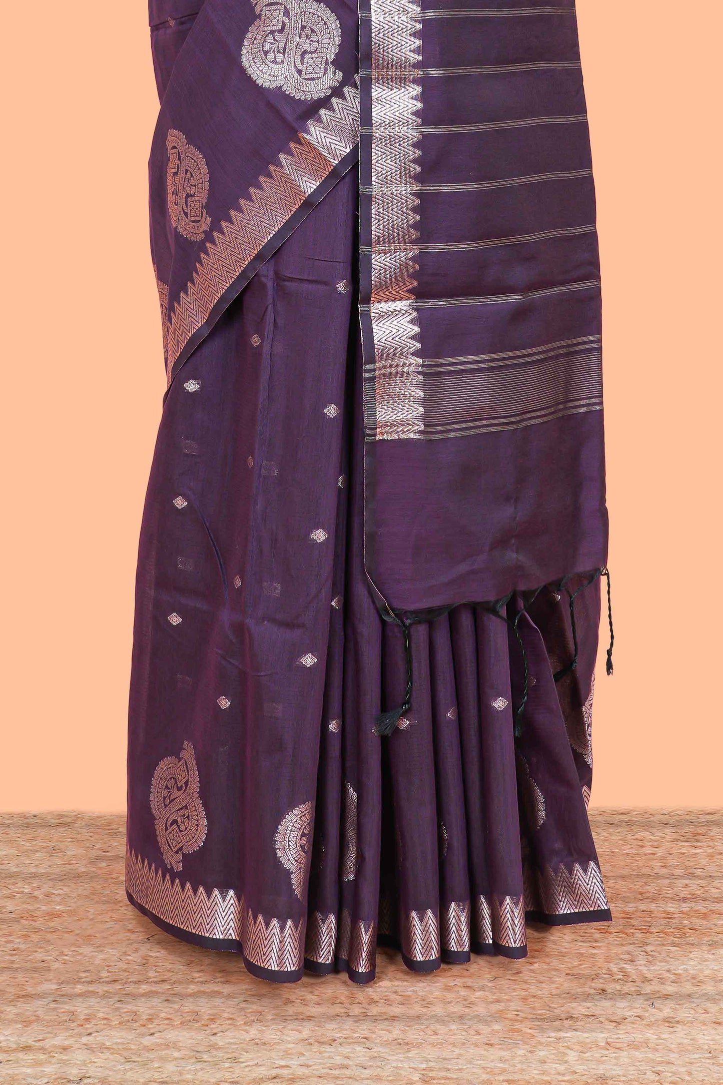 Purple mushru silk saree with zari butta, self zari border and striped pallu