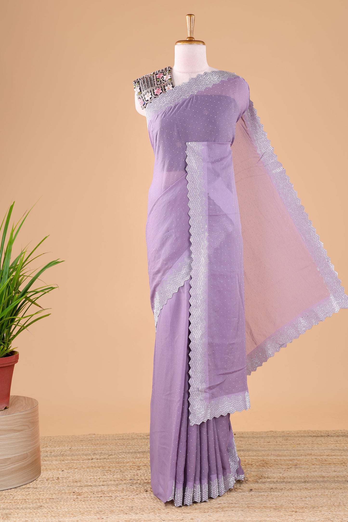 Lavender designer georgette space silk saree with heavy stone & beads work, short pallu and contrast sequin embroidered blouse