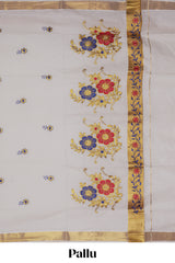 Cream floral motifs design kerala cotton saree with self zari border and matching blouse