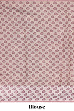Pink polka motifs design art tissue saree with contrast floral design border and matching motifs blouse