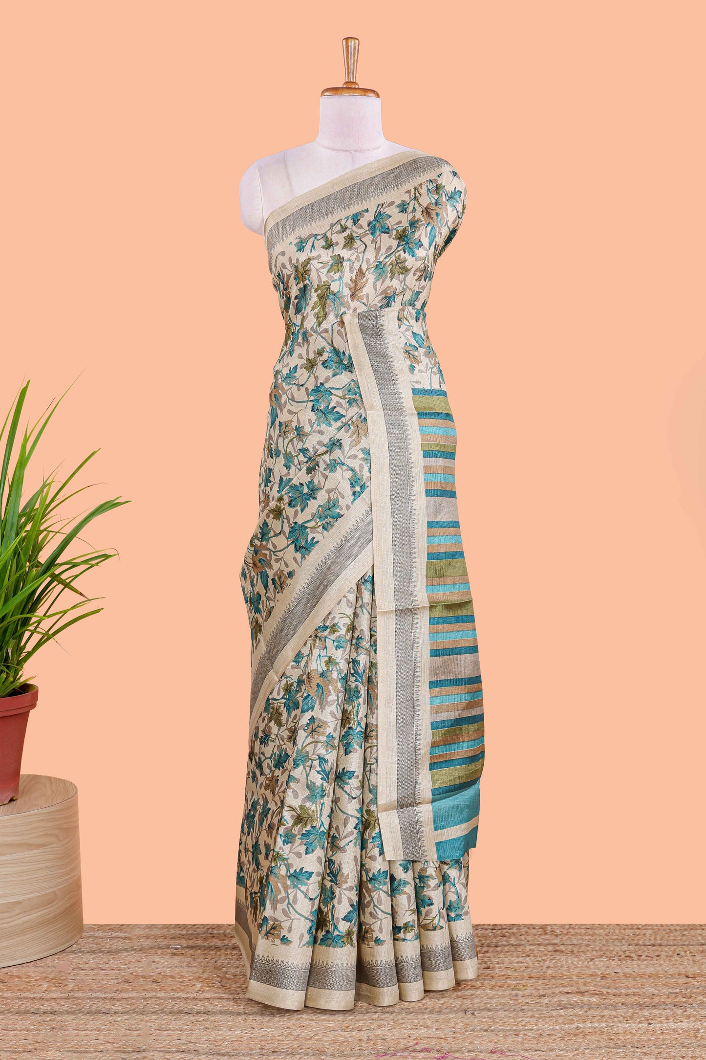 Beige south cotton saree featuring all over floral prints on the body and pallu