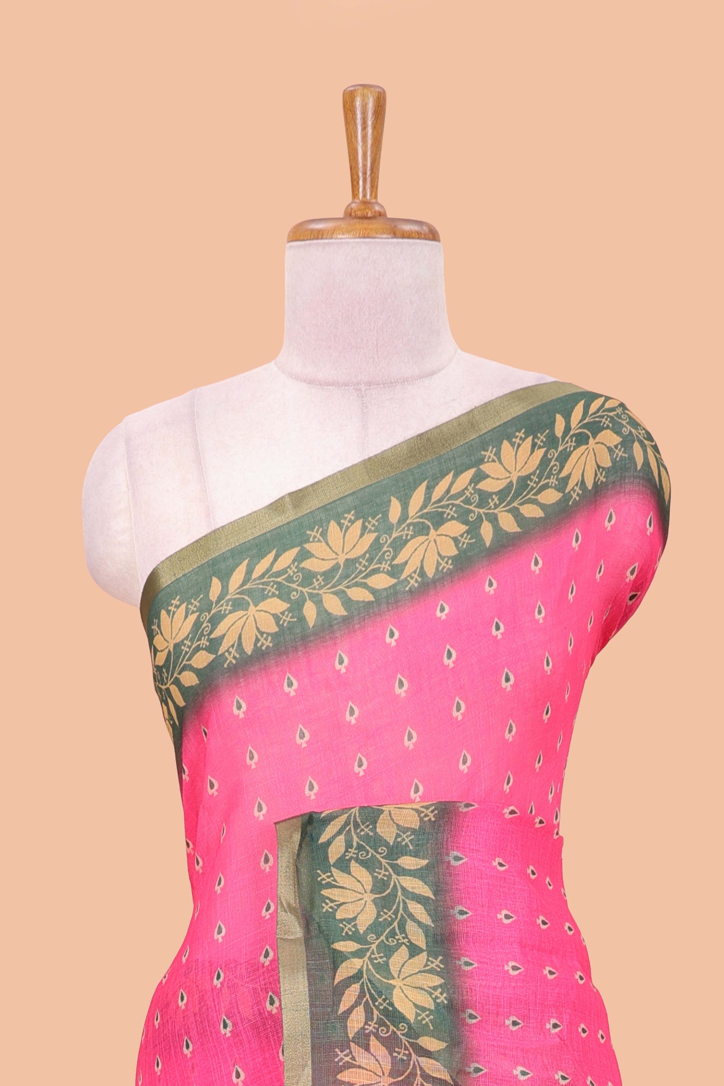 Pink linen saree with all-over butta print, contrast border, printed pallu, and contrast blouse