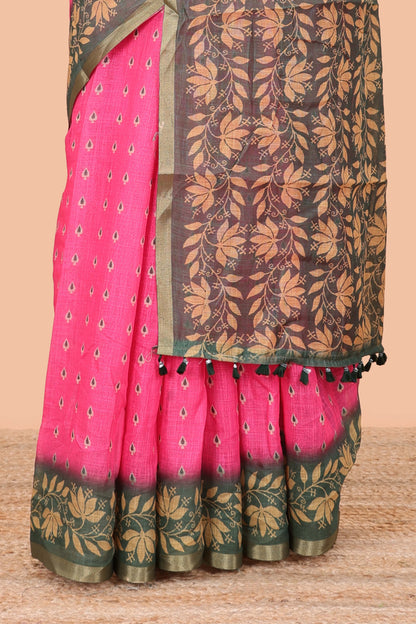 Pink linen saree with all-over butta print, contrast border, printed pallu, and contrast blouse