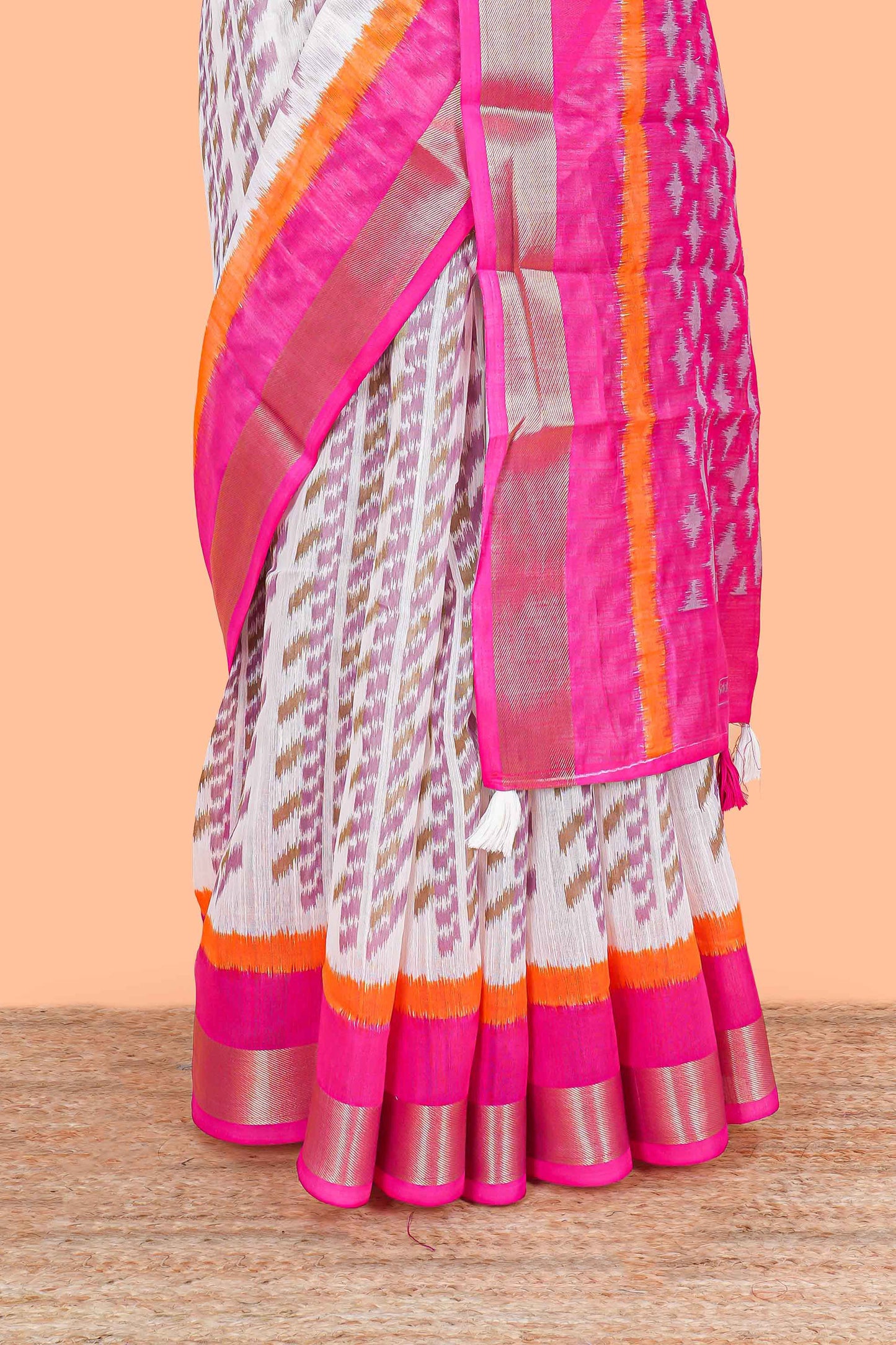 White ikkat style linen cotton saree with contrast border  and pallu