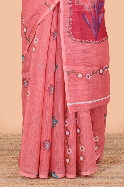 Borderless pink linen saree with floral design, printed pallu and blouse