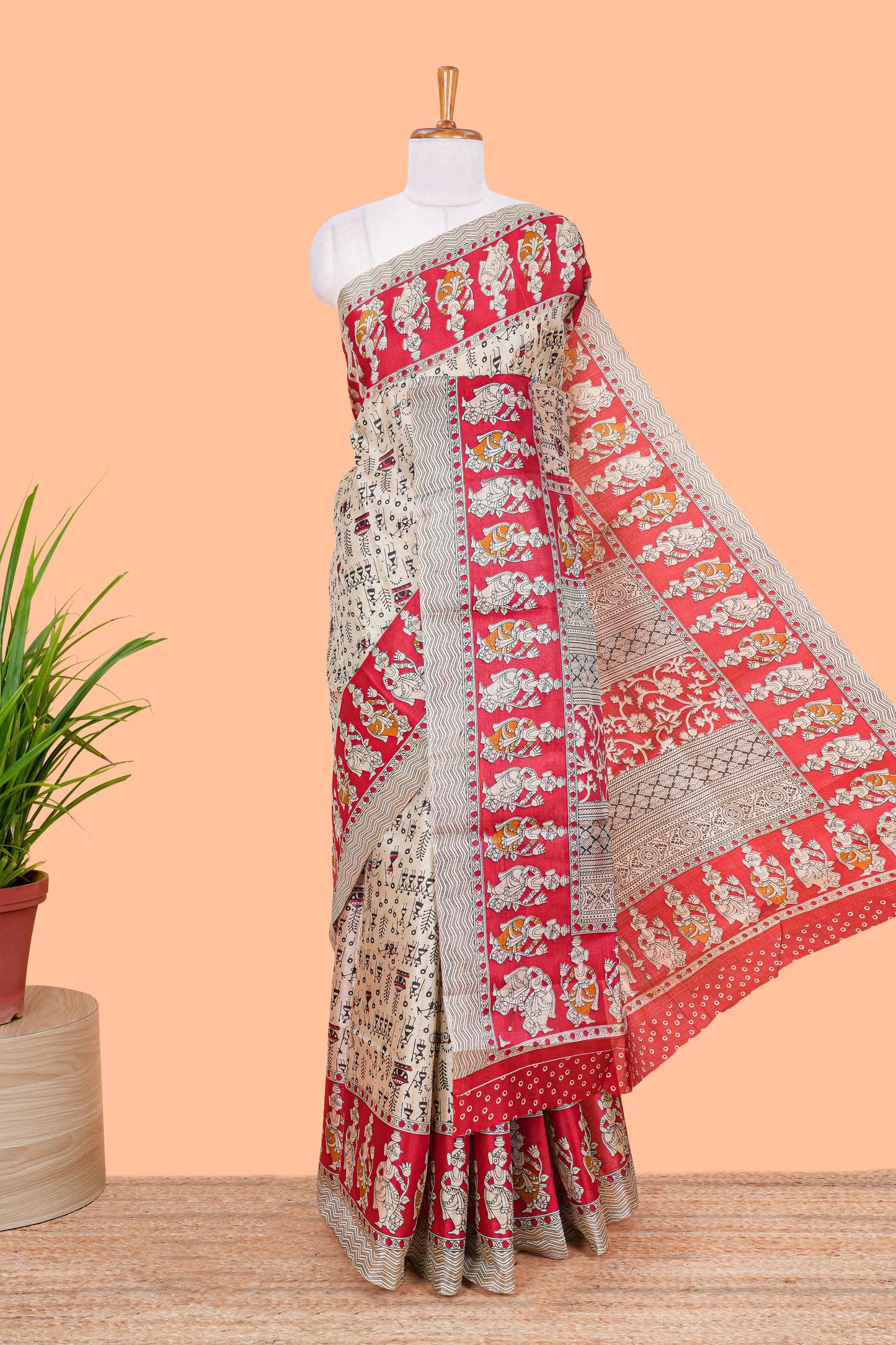 Cream khadi cotton saree with warli design print on body and pallu