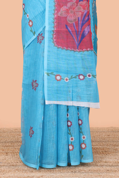 Borderless blue linen saree with floral design, printed pallu and blouse