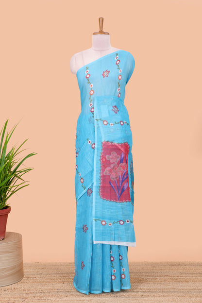 Borderless blue linen saree with floral design, printed pallu and blouse