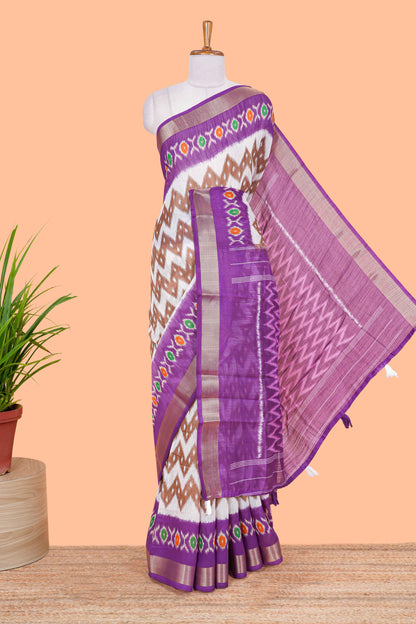 White geomentric ikkat style linen cotton saree with contrast purple border and pallu