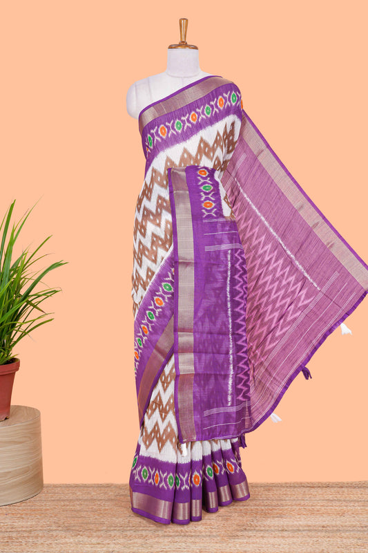 White geomentric ikkat style linen cotton saree with contrast purple border and pallu