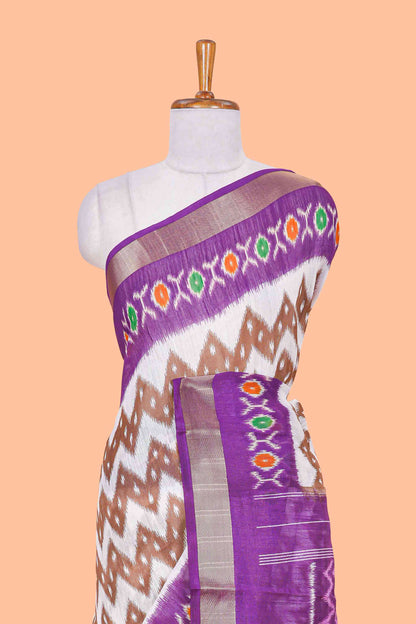White geomentric ikkat style linen cotton saree with contrast purple border and pallu