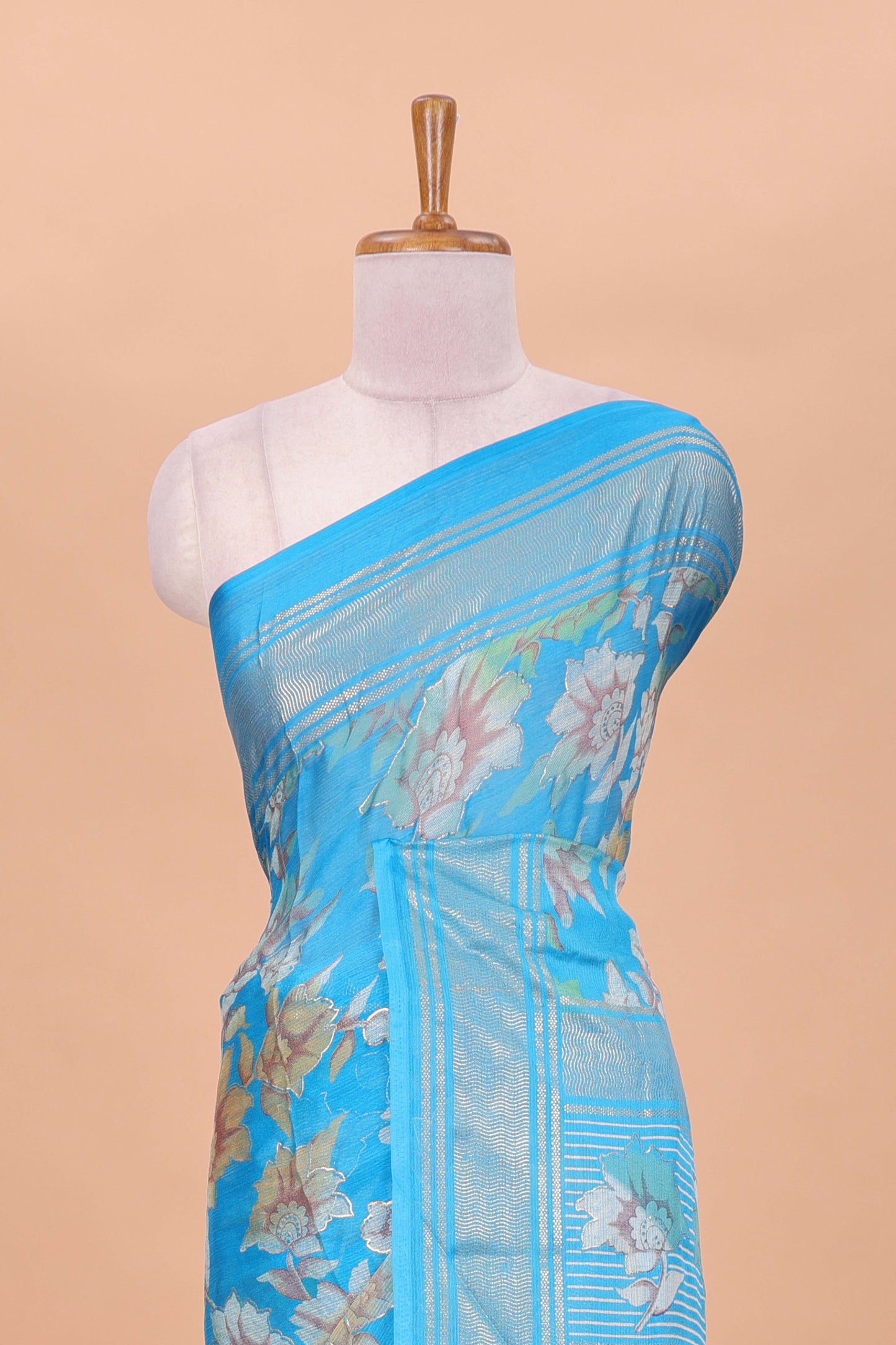 Blue moss chiffon floral print saree with gold zari border and pallu
