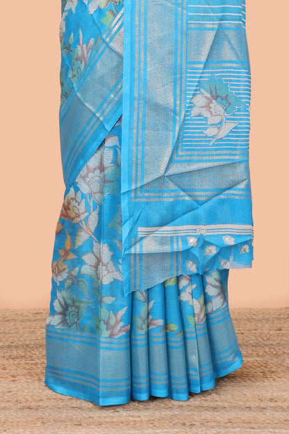 Blue moss chiffon floral print saree with gold zari border and pallu