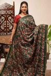Green floral design tussar saree with self zari border and matching blouse
