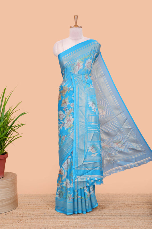 Blue moss chiffon floral print saree with gold zari border and pallu