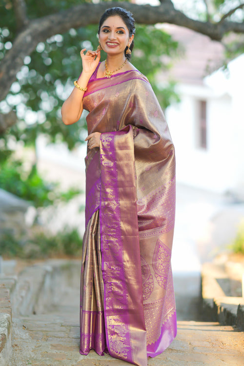 Peach geometric checked  floral motifs design with contrast palak zari design border and blouse