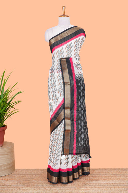 White geomentric ikkat style linen cotton saree with contrast black border and pallu