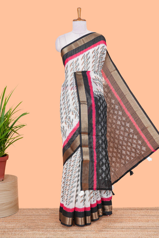 White geomentric ikkat style linen cotton saree with contrast black border and pallu