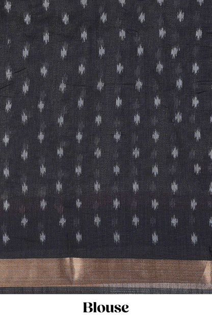 White geomentric ikkat style linen cotton saree with contrast black border and pallu