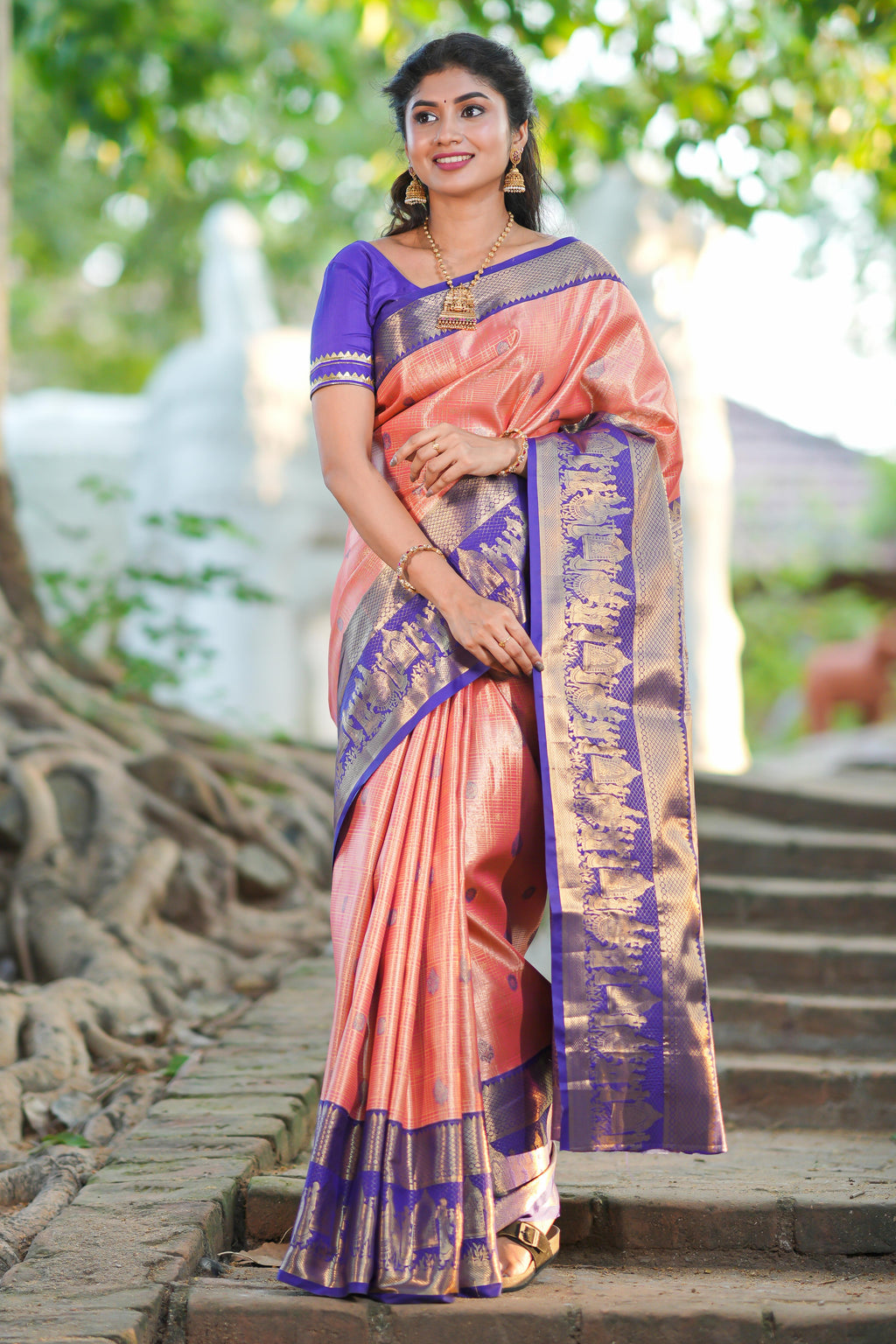 Orange geometric checked  floral motifs design with contrast palak zari design border and blouse