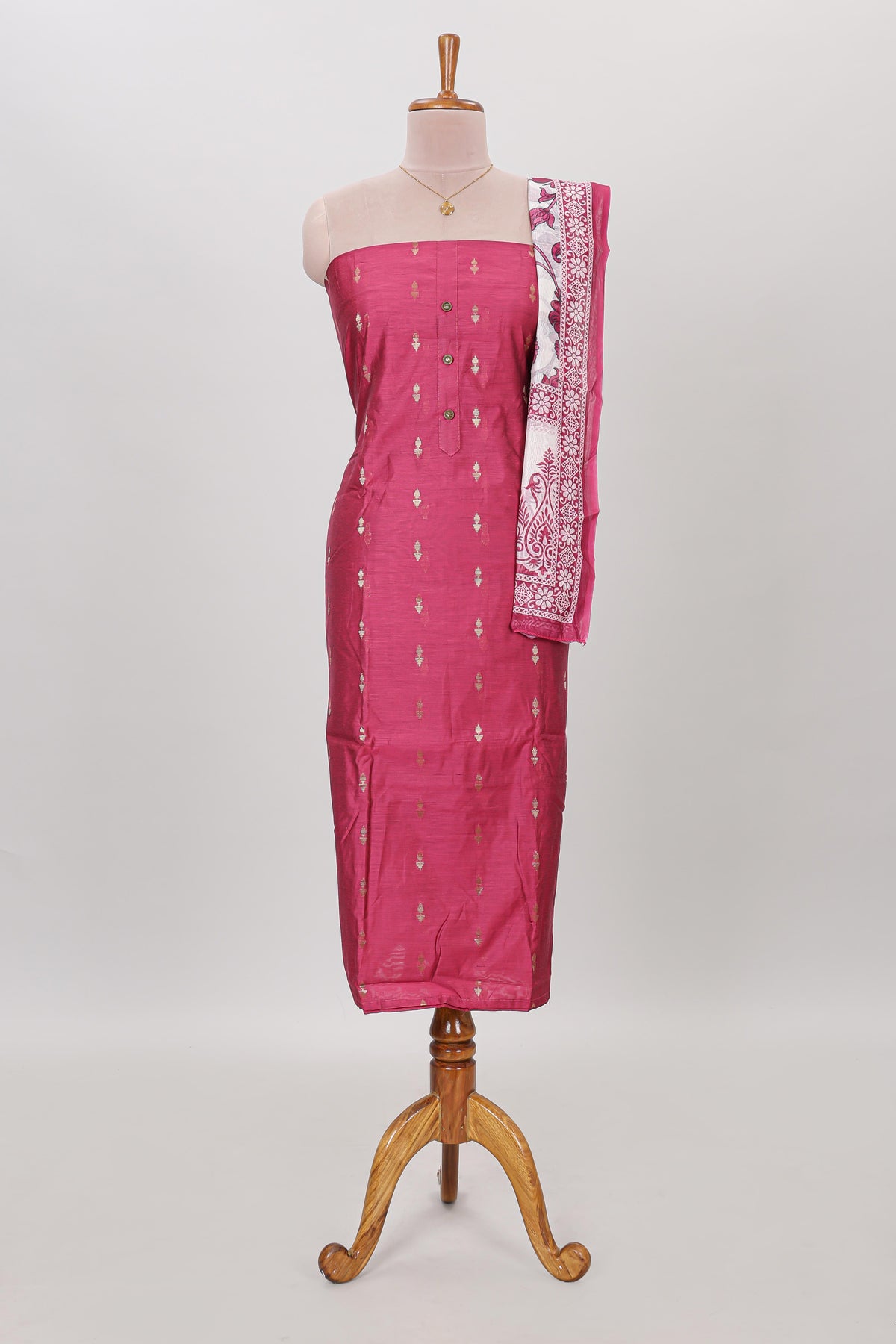 Pink zari motifs chudidhar material with matching solid pant and contrast floral dupatta