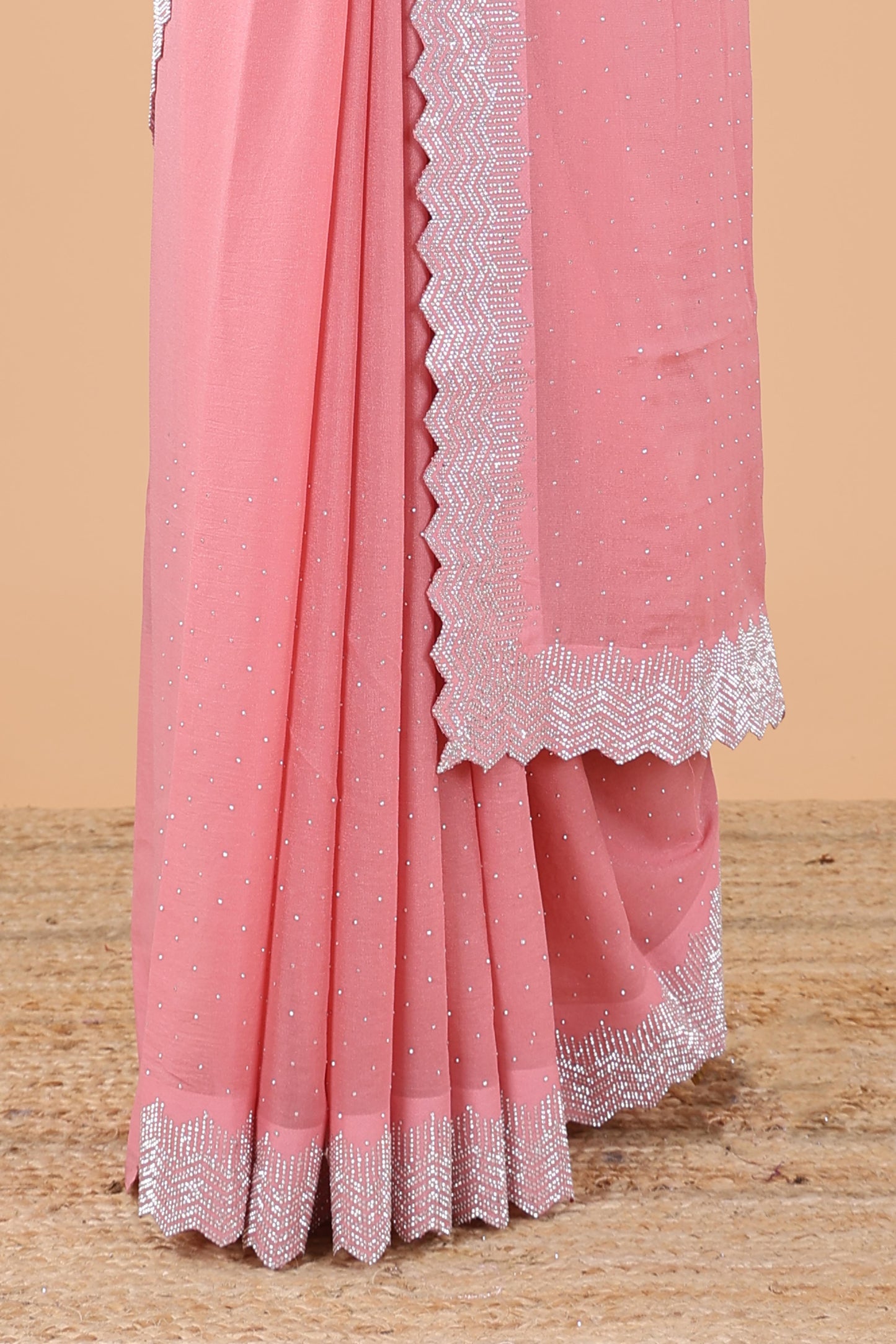 Pink designer georgette space silk saree with heavy stone & beads work, short pallu and contrast sequin embroidered blouse