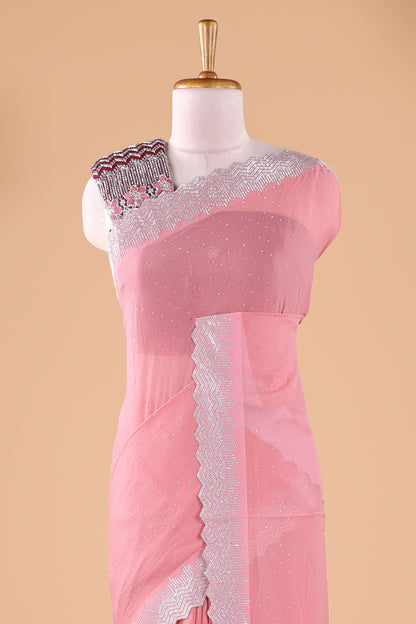 Pink designer georgette space silk saree with heavy stone & beads work, short pallu and contrast sequin embroidered blouse