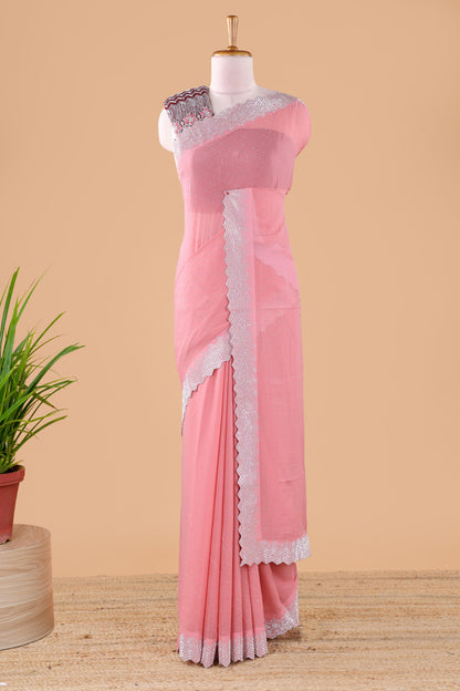 Pink designer georgette space silk saree with heavy stone & beads work, short pallu and contrast sequin embroidered blouse