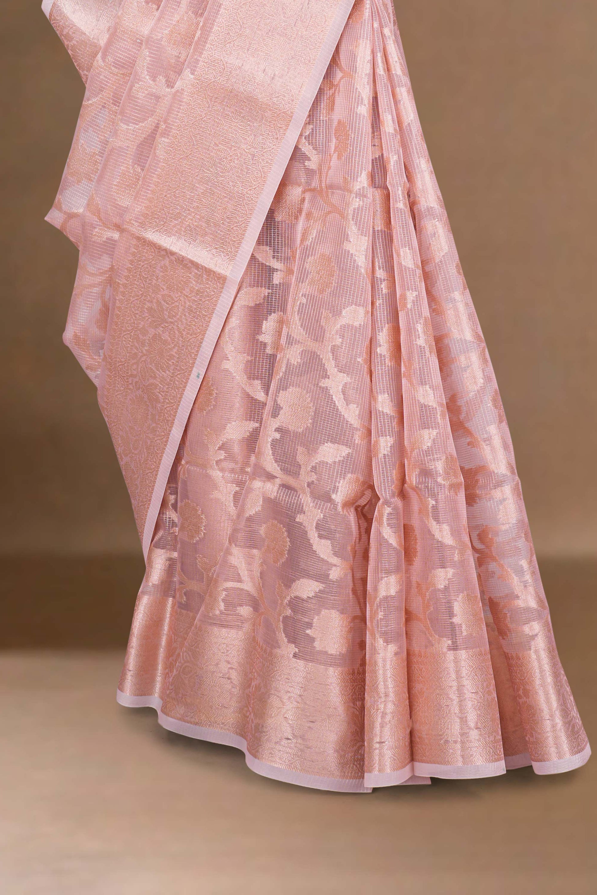 Pink saree with intricate patterns 