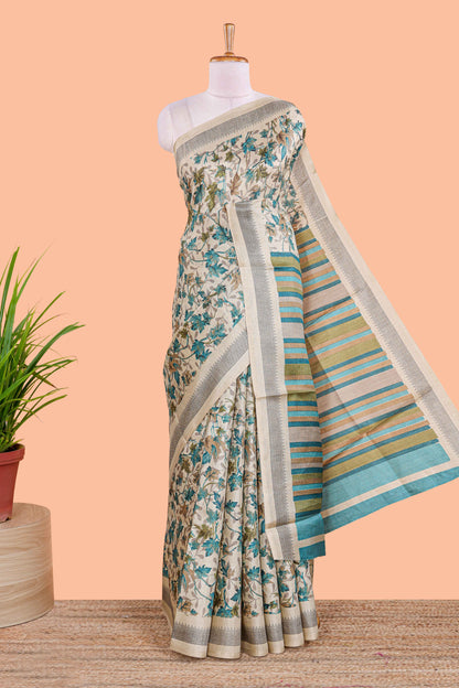 Beige south cotton saree featuring all over floral prints on the body and pallu