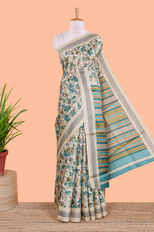 Beige south cotton saree featuring all over floral prints on the body and pallu