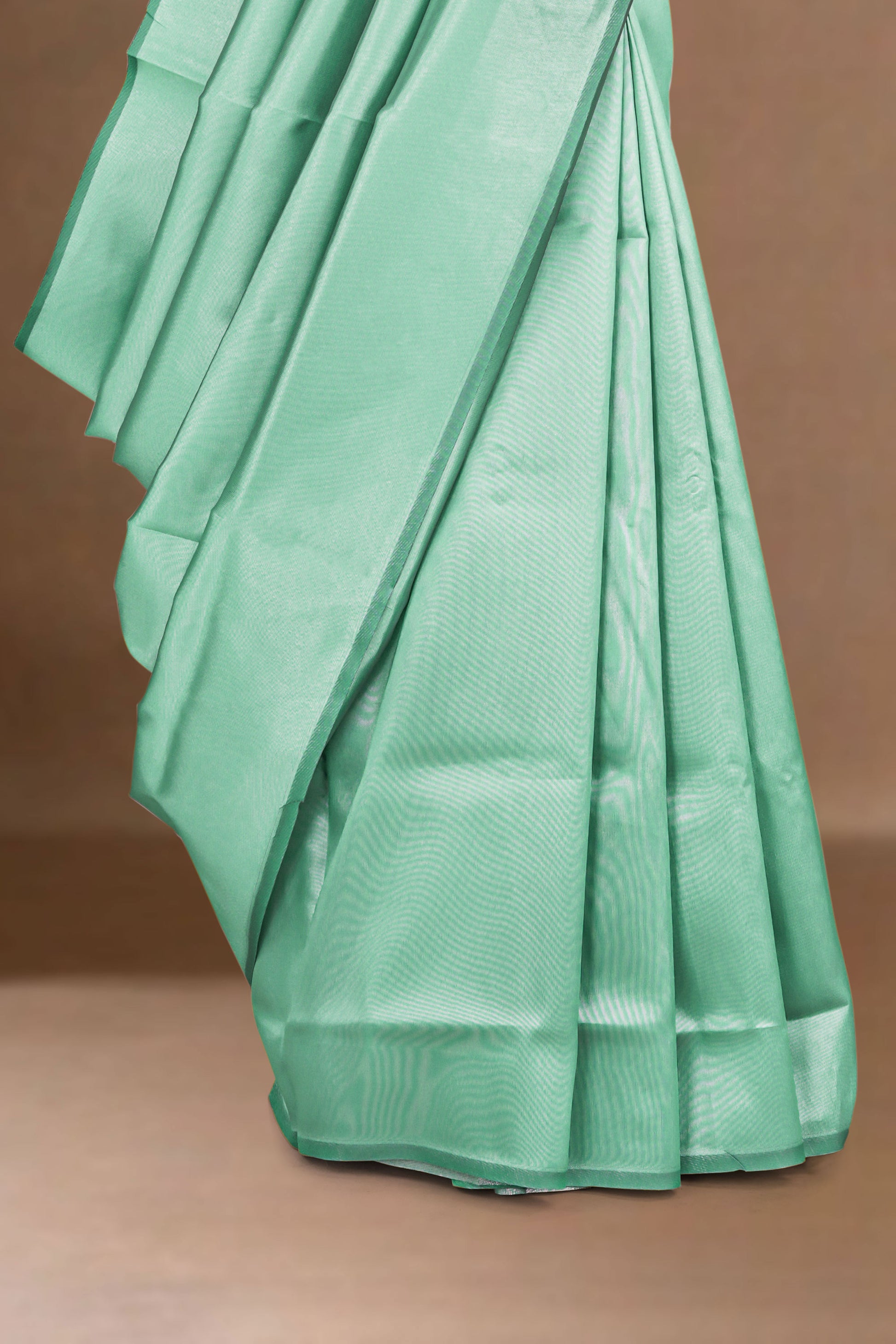 green lichi silk saree with silver zari