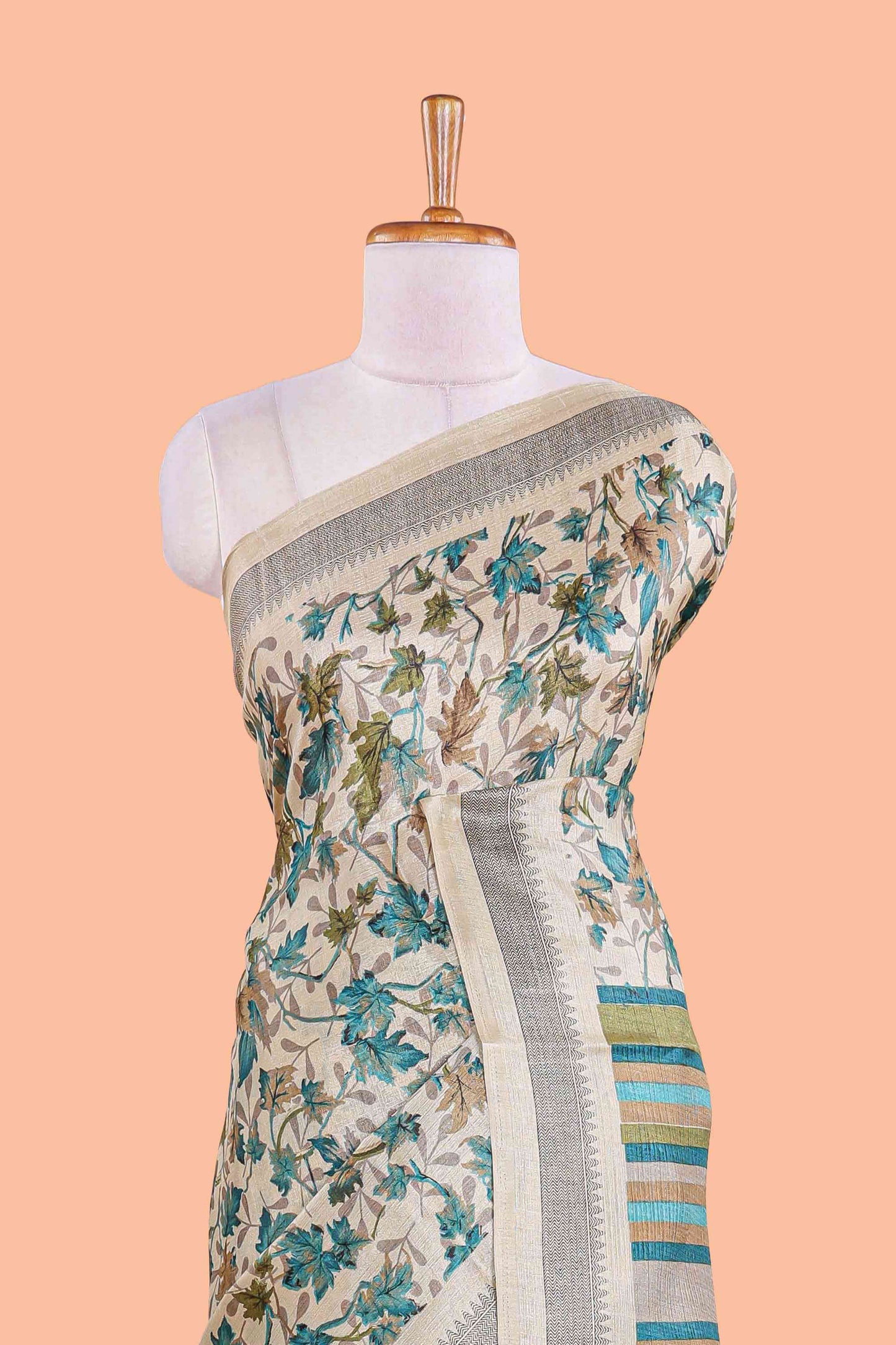 Beige south cotton saree featuring all over floral prints on the body and pallu