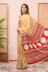 Modal Silk Sareehe Body Has Contrast Vibrant Yellow Vertical Stripes The Pallu Are Highlighted Ajrakh Design Along With Blouse