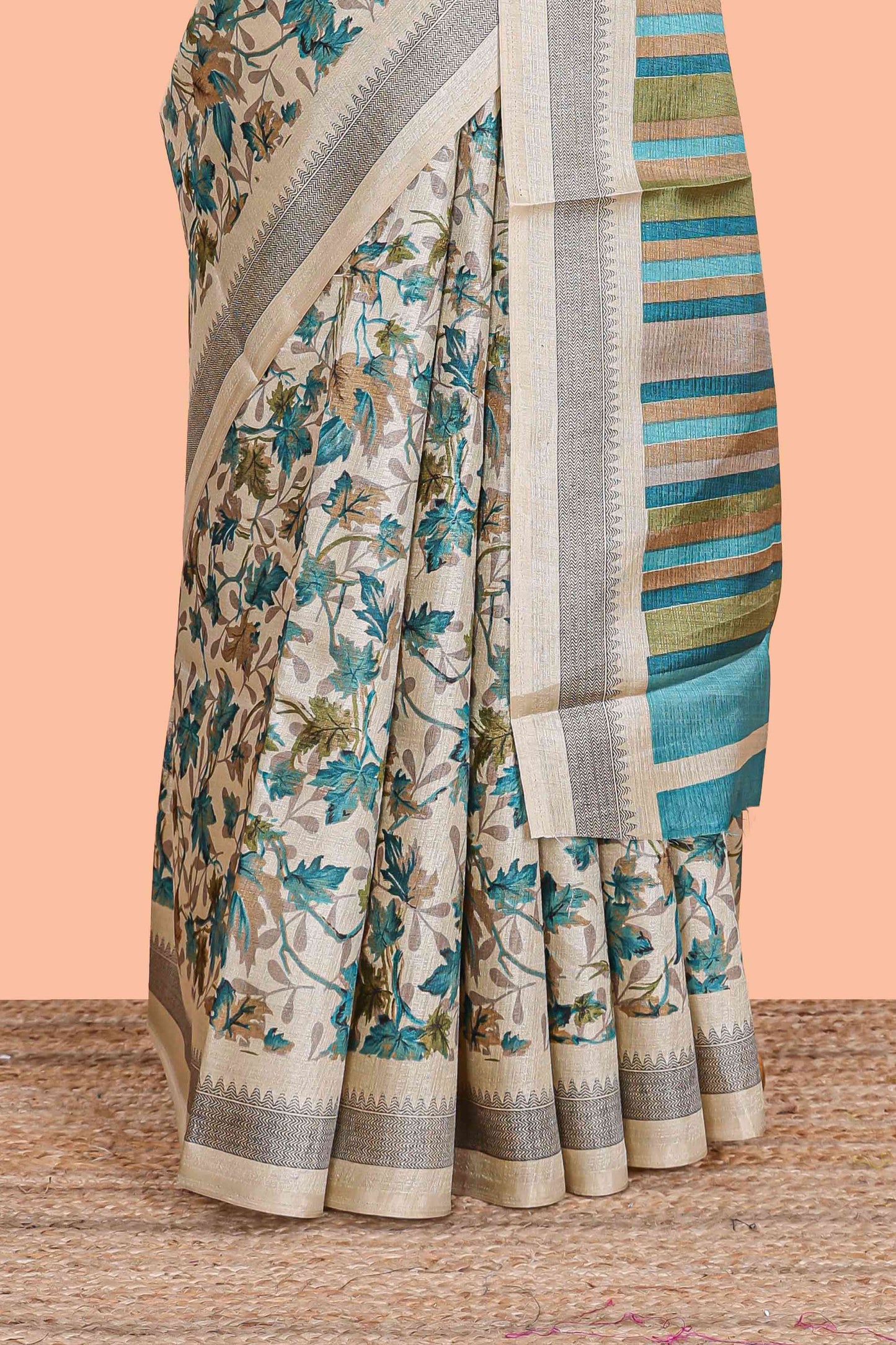 Beige south cotton saree featuring all over floral prints on the body and pallu