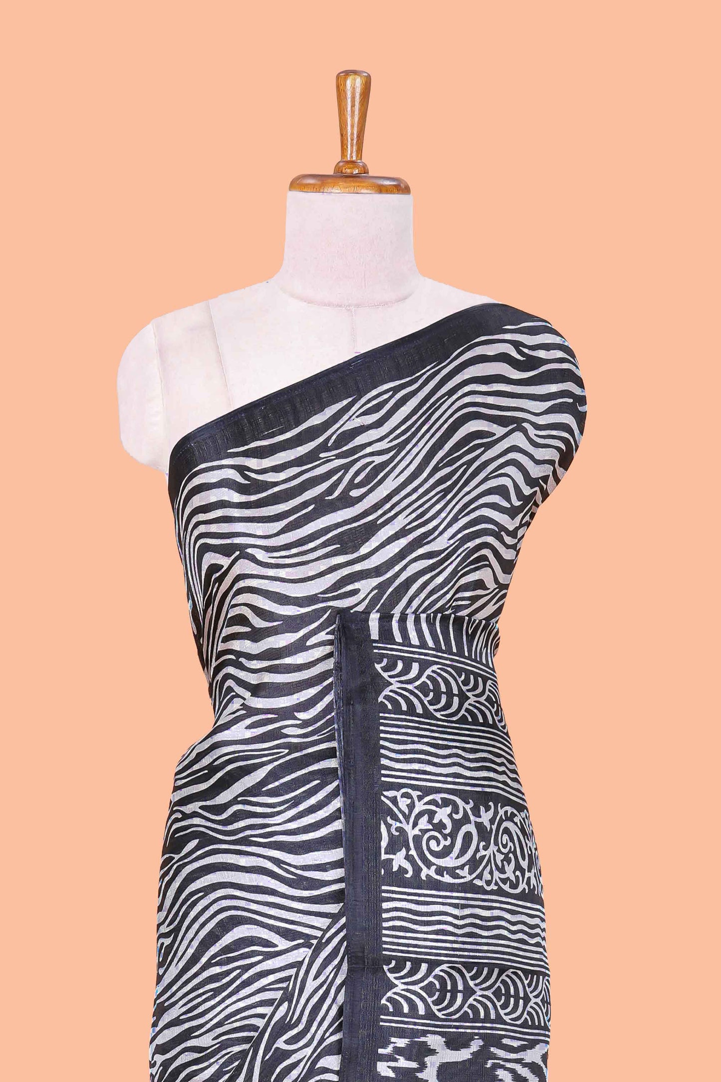 khadi cotton saree with zebra print all over body and pallu along with contrast blouse