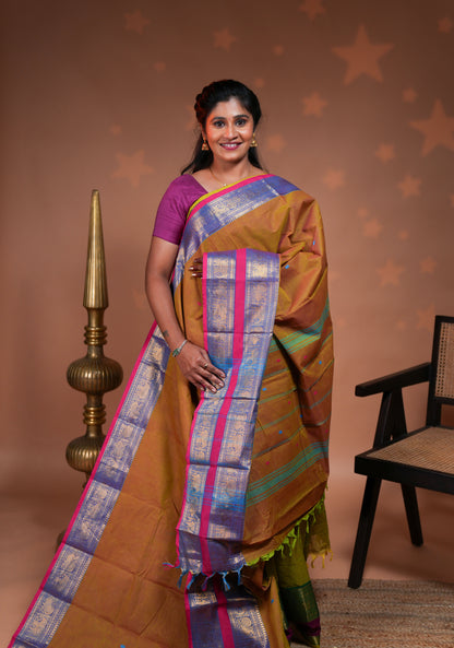 Mustard plain chettinad cotton saree with contrast bentex zari border and floral motifs pallu