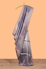 Steel blue floral design motifs art tissue saree with scallop design border and matching plain blouse